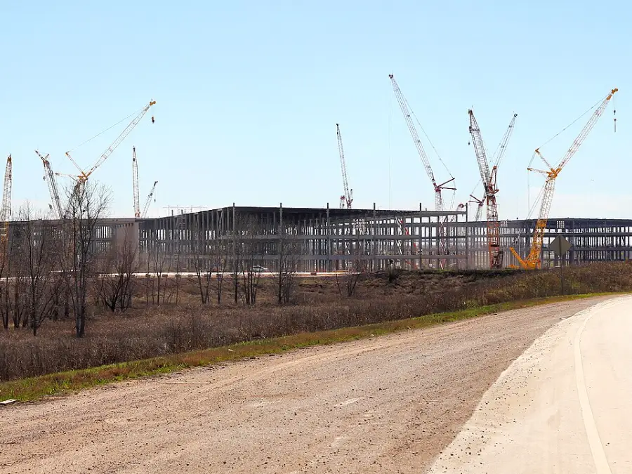 Tower cranes over a large factory under construction near Austin, Texas